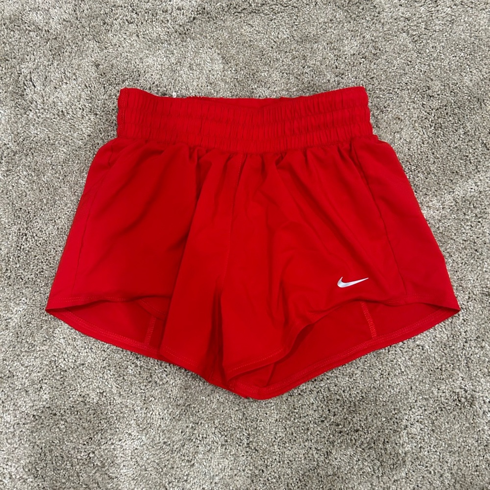 Bright red Nike shorts